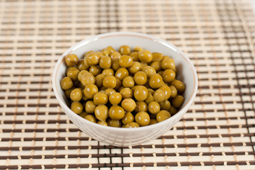 Canned green peas in the salad bowl