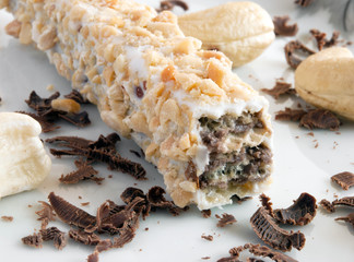 Luxury small cake decorated with nuts and chocolate