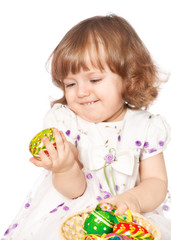 Fototapeta na wymiar Beautiful girl holding Easter eggs