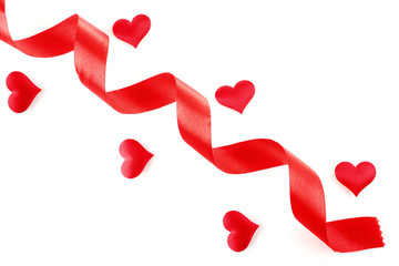 red ribbon with hearts isolated on white background