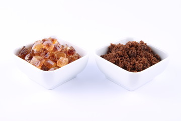 Sugar: brown and brown rock candy in bowls