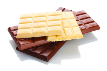 Bar of milk, dark and white chocolate isolated on white