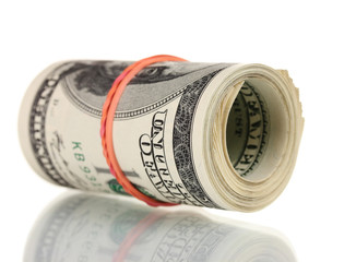 A lot of one hundred dollar bills tied rubber band isolated