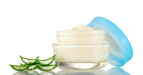 Opened glass jar of cream and aloe isolated on white