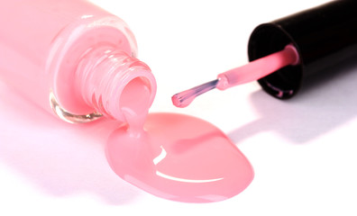 Pink nail polish isolated on white