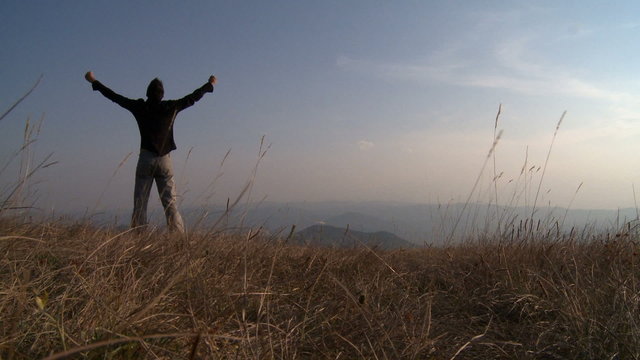 Man on the top of a hill