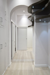 Brown shaped wood shelf - Hallway