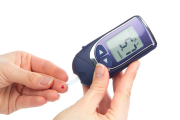 Diabetes patient measuring glucose level blood test