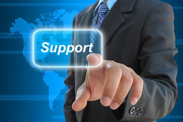 businessman hand pushing support button