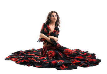 young woman sit in gypsy black and red costume