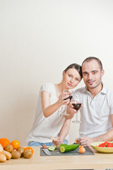 Young love couple cooking. Big copyspace