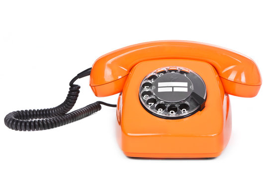 classic dial phone on white