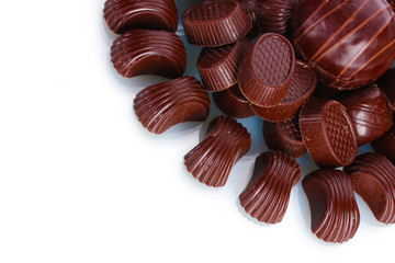Many different chocolate candy isolated on white