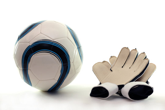 Bal&oacute;n y guantes