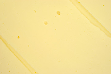 Close view sharp cheddar cheese © Bert Folsom