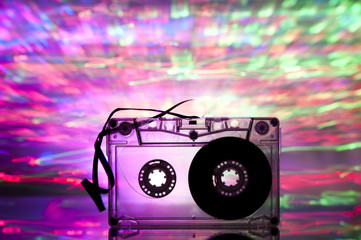 Fototapeta premium Cassette tape and multicolored lights