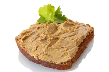 Fresh pate on bread isolated on white