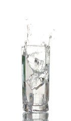 fresh water in glass with ice cubes isolated on white