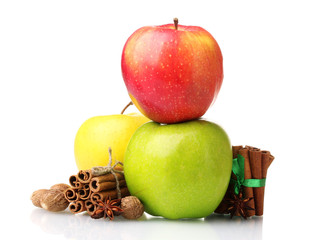 Cinnamon sticks, apples, nutmeg and anise isolated on white