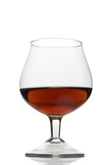 Glass of cognac isolated on white
