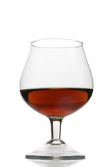 Glass of cognac isolated on white