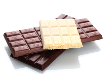 Bar of milk, dark and white chocolate isolated on white