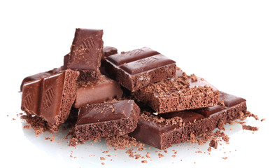 Slices of milk and dark chocolate bar with chocolate shavings