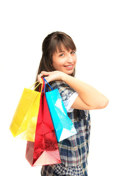 young girl with shopping bags