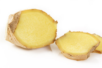 cut ginger on white background