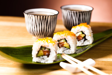 sushi rolls  with tea