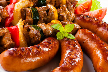 Grilled meat, sausages and vegetables