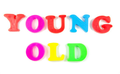 young and old written in fridge magnets