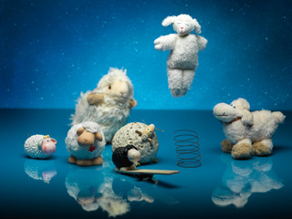 funny toy sheeps playing different games, night