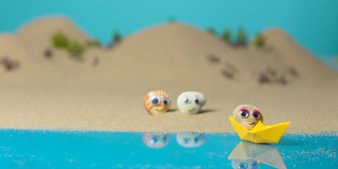 funny sea shells in a miniature landscape