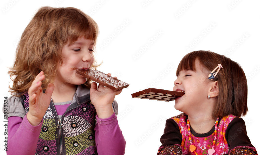 Wall mural two little girls eating chocolate