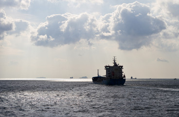 Cargo ship sails away