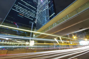 Fototapeta na wymiar Modern skyscrapers and traffic in downtown of Hong Kong