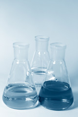 Three conical chemical glassware
