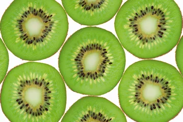 Papier Peint photo Tranches de fruits fond de kiwi