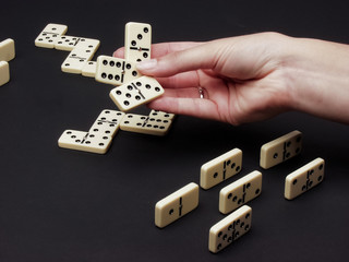 hand with domino