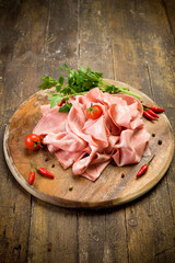 Mortadella slices with red pepper - 38324150