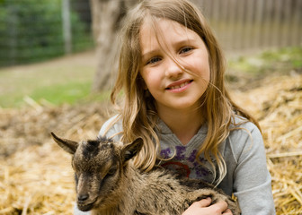 Gril with goatling