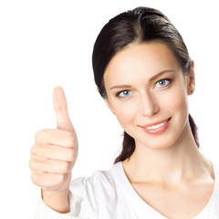 Businesswoman with thumbs up, on white