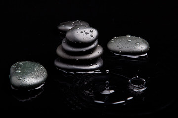 Spa Stones. shiny zen stones with water drops