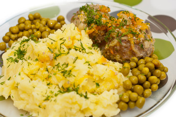 Meatballs with mashed potatoes and peas