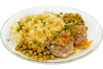Meatballs with mashed potatoes and peas on white background