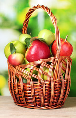 Healthy ripe apples in the bascet outdoors