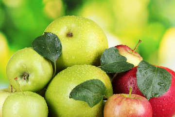 Fresh organic apples on wooden table isolated on white