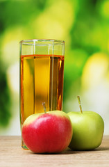Healthy organic apple juice on table