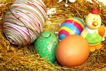 easter eggs and ceramic chick